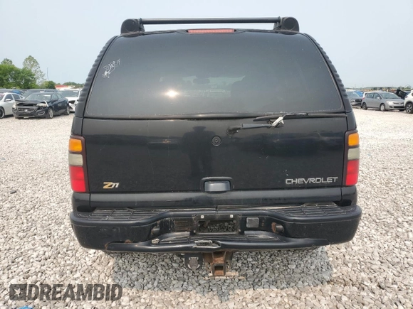 2004 Chevrolet Tahoe Z71 z VIN 1GNEK13ZX4R159262, wystawiony jako Copart lot #58047455 z przebiegiem Nie podano mil oraz Szkoda całkowita • Salvage title. Historia ofert i sprzedaży dostępna na DreamBid. Obrazek 6.