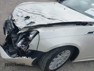 2012 Cadillac CTS Luxury with VIN 1G6DF5E55C0127450, listed as a IAAI auction lot 42020764 with 150,597 mi miles and . Bid and sale history available at DreamBid. Image 13.