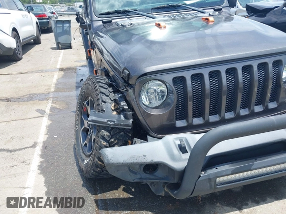 2019 Jeep Wrangler Unlimited Sport S with VIN 1C4HJXDN4KW577273, listed as a IAAI auction lot 42435847 with 69,403 mi miles and . Bid and sale history available at DreamBid. Image 17.