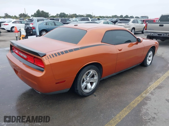 2011 Dodge Challenger z VIN 2B3CJ4DG9BH602419, wystawiony jako IAAI lot #40753257 z przebiegiem 124 282 mil mil oraz . Historia ofert i sprzedaży dostępna na DreamBid. Obrazek 4.