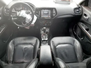 2018 Jeep Compass Limited with VIN 3C4NJDCB4JT128687, listed as a Copart auction lot 57648245 with 136,455 mi miles and Salvage title. Bid and sale history available at DreamBid. Image 8.