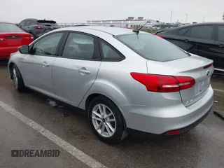 2017 Ford Focus SE with VIN 1FADP3F24HL303600, listed as a IAAI auction lot 41948159 with 95,212 mi miles and . Bid and sale history available at DreamBid. Image 3.