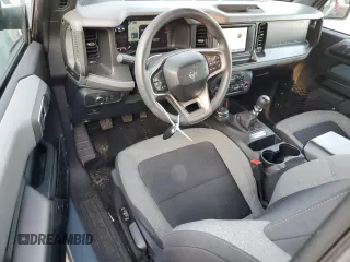 2022 Ford Bronco z VIN 1FMDE5AH6NLB71051, wystawiony jako Copart lot #77580794 z przebiegiem 20 904 mil mil oraz Szkoda całkowita • Salvage title. Historia ofert i sprzedaży dostępna na DreamBid. Obrazek 8.