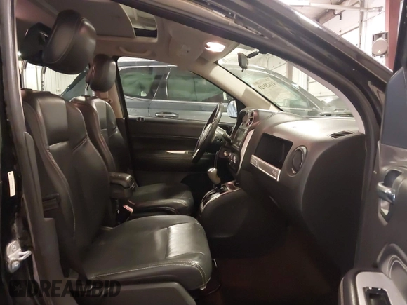 2015 Jeep Compass Latitude with VIN 1C4NJDEBXFD304409, listed as a IAAI auction lot 41629121 with 123,486 mi miles. Bid and sale history available at carsss.com. Image 5.