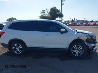 2018 Honda Pilot EX-L с VIN 5FNYF5H55JB031486, выставлен на аукционе IAAI как лот 41948989 с пробегом 88 241 миль миль и . История ставок и продаж доступна на DreamBid. Изображение 14.