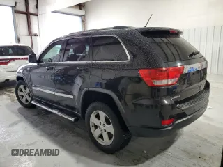 2012 Jeep Grand Cherokee Laredo with VIN 1C4RJEAG4CC146160, listed as a Copart auction lot 87515345 with 116,936 mi miles and Salvage Title. Bid and sale history available at carsss.com. Image 2.