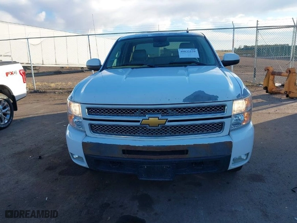 2013 Chevrolet Silverado 1500 LTZ with VIN 3GCPKTE71DG217428, listed as a IAAI auction lot 40835120 with 195,000 mi miles. Bid and sale history available at carsss.com. Image 12.