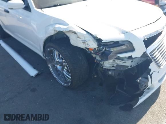 2014 Chrysler 300 S with VIN 2C3CCABG0EH235784, listed as a IAAI auction lot 41345692 with 109,920 mi miles and . Bid and sale history available at DreamBid. Image 6.