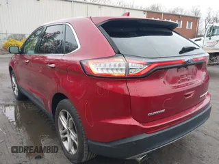 2015 Ford Edge Titanium z VIN 2FMTK4K94FBB69970, wystawiony jako IAAI lot #41982057 z przebiegiem 97 422 mil mil oraz . Historia ofert i sprzedaży dostępna na DreamBid. Obrazek 3.