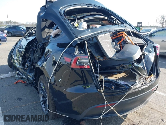 2024 Tesla Model Y Long Range with VIN 7SAYGDEE4RF149894, listed as a IAAI auction lot 41771185 with Not Provided miles and . Bid and sale history available at DreamBid. Image 3.