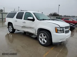 2012 Chevrolet Suburban LTZ with VIN 1GNSCKE08CR301286, listed as a Copart auction lot 45987595 with 213,381 mi miles and Salvage Title. Bid and sale history available at carsss.com. Image 4.