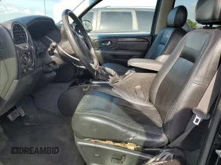 2006 GMC Envoy SLE z VIN 1GKDS13S062176000, wystawiony jako Copart lot #57672995 z przebiegiem 161 455 mil mil oraz Szkoda całkowita • Salvage title. Historia ofert i sprzedaży dostępna na DreamBid. Obrazek 7.