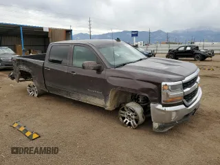 2016 Chevrolet Silverado 1500 LT with VIN 3GCUKREC9GG262656, listed as a Copart auction lot 44765435 with 112,940 mi miles and Salvage Title. Bid and sale history available at DreamBid. Image 4.