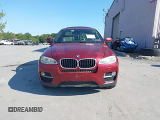 2014 BMW X6 xDrive35i z VIN 5UXFG2C57E0C44052, wystawiony jako IAAI lot #40231766 z przebiegiem 131 573 mil mil oraz . Historia ofert i sprzedaży dostępna na DreamBid. Obrazek 13.