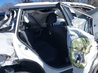 2019 Toyota RAV4 Hybrid XLE with VIN JTMRWRFV0KD033153, listed as a IAAI auction lot 41640540 with 42,740 mi miles. Bid and sale history available at carsss.com. Image 8.