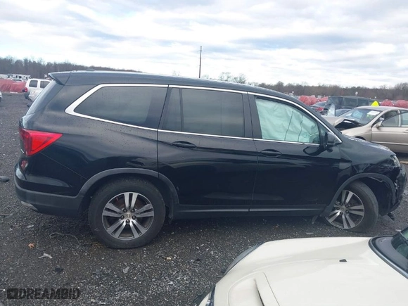 2016 Honda Pilot EX-L with VIN 5FNYF6H5XGB022913, listed as a IAAI auction lot 40914838 with 148,950 mi miles. Bid and sale history available at carsss.com. Image 14.