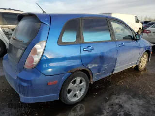 2005 Suzuki Aerio SX z VIN JS2RC61H655300809, wystawiony jako Copart lot #42507415 z przebiegiem 273 937 mil mil oraz Szkoda całkowita • Salvage title. Historia ofert i sprzedaży dostępna na DreamBid. Obrazek 3.