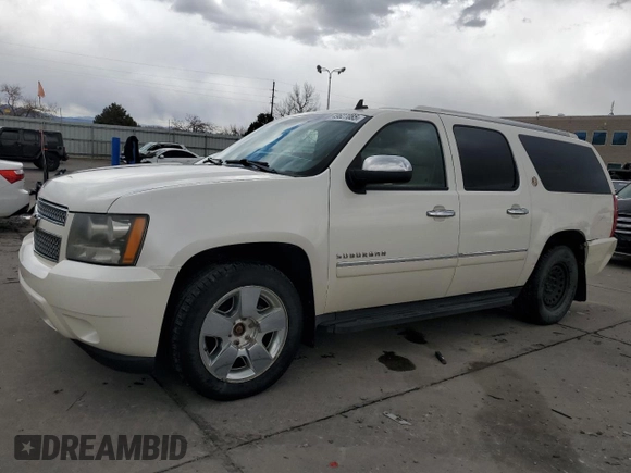 2010 Chevrolet Suburban LTZ with VIN 1GNUKKE35AR292291, listed as a Copart auction lot 49627085 with 233,359 mi miles and Salvage Title. Bid and sale history available at carsss.com. Image 1.