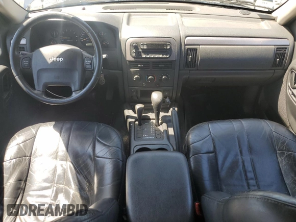 2004 Jeep Grand Cherokee Laredo with VIN 1J4GW48N34C425845, listed as a Copart auction lot 61200555 with 133,664 mi miles and Clean title. Bid and sale history available at DreamBid. Image 8.