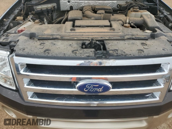 2013 Ford Expedition XLT z VIN 1FMJU1J53DEF03034, wystawiony jako Copart lot #51497475 z przebiegiem 167 738 mil mil oraz Szkoda całkowita • Salvage title. Historia ofert i sprzedaży dostępna na DreamBid. Obrazek 14.