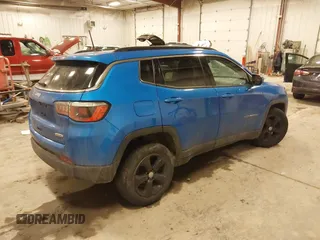 2018 Jeep Compass Altitude with VIN 3C4NJDBB5JT345165, listed as a IAAI auction lot 41618844 with 66,226 mi miles and . Bid and sale history available at carsss.com. Image 4.