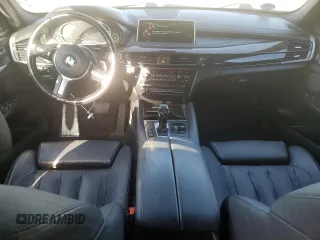 2016 BMW X6 xDrive50i with VIN 5UXKU6C57G0R33958, listed as a Copart auction lot 49774065 with 124,226 mi miles and Salvage Title. Bid and sale history available at carsss.com. Image 8.