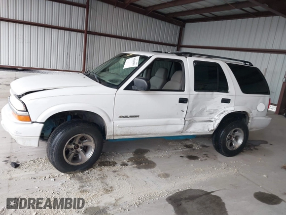 2004 Chevrolet Blazer LS z VIN 1GNDT13X64K129093, wystawiony jako IAAI lot #41860109 z przebiegiem 175 588 mil mil oraz . Historia ofert i sprzedaży dostępna na DreamBid. Obrazek 14.