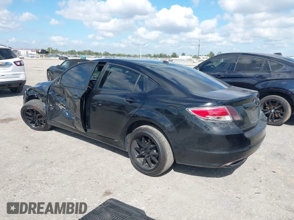 2009 Mazda 6 S Grand Touring with VIN 1YVHP82BX95M21939, listed as a IAAI auction lot 41527269 with 154,544 mi miles and . Bid and sale history available at DreamBid. Image 3.