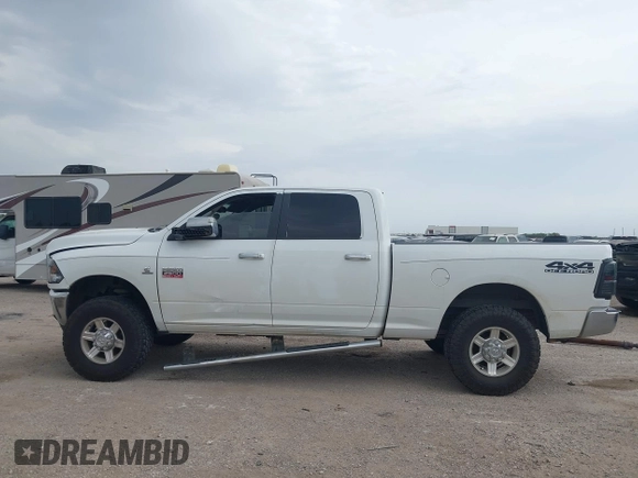 2011 Ram 2500 Big Horn with VIN 3D7UT2CL0BG510699, listed as a IAAI auction lot 42282752 with 404,636 mi miles and . Bid and sale history available at DreamBid. Image 14.