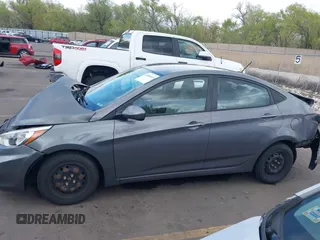 2015 Hyundai Accent GLS with VIN KMHCT4AE8FU825898, listed as a IAAI auction lot 42066640 with 79,593 mi miles and . Bid and sale history available at DreamBid. Image 14.