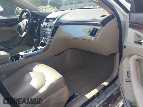 2010 Cadillac CTS Luxury with VIN 1G6DE5EG9A0118042, listed as a IAAI auction lot 42448076 with 142,359 mi miles and . Bid and sale history available at DreamBid. Image 5.