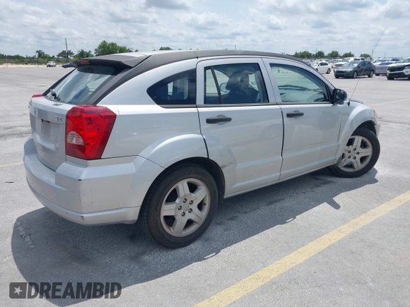 2008 Dodge Caliber SE with VIN 1B3HB28B98D757953, listed as a IAAI auction lot 42111663 with 115,977 mi miles. Bid and sale history available at carsss.com. Image 4.