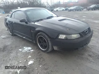2003 Ford Mustang Standard with VIN 1FAFP40473F313103, listed as a IAAI auction lot 35721795 with 202,013 mi miles and . Bid and sale history available at DreamBid. Image 1.