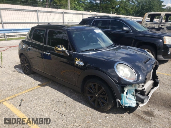 2016 MINI Hardtop 4 Door S with VIN WMWXU3C58G2B67264, listed as a Copart auction lot 61454215 with 66,550 mi miles and Salvage title. Bid and sale history available at DreamBid. Image 4.