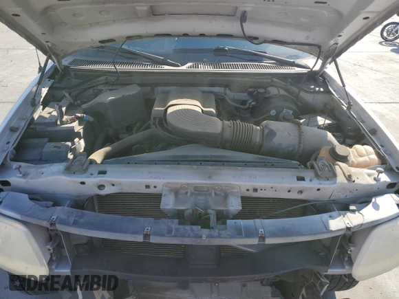 1997 Ford Expedition XLT z VIN 1FMEU1768VLA49281, wystawiony jako Copart lot #79895244 z przebiegiem 73 188 mil mil oraz Szkoda całkowita • Salvage title. Historia ofert i sprzedaży dostępna na DreamBid. Obrazek 14.