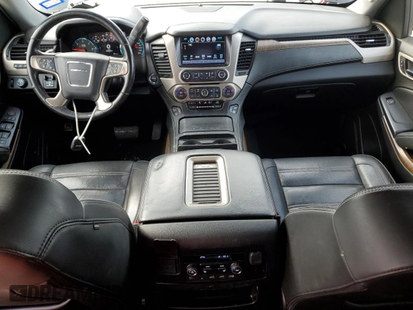 2018 GMC Yukon Denali with VIN 1GKS1CKJ8JR201028, listed as a Copart auction lot 83478394 with 133,302 mi miles and Salvage Title. Bid and sale history available at carsss.com. Image 8.
