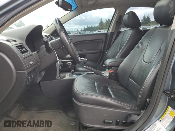 2012 Ford Fusion SEL with VIN 3FAHP0JG3CR118368, listed as a Copart auction lot 62387845 with 185,305 mi miles and Salvage title. Bid and sale history available at DreamBid. Image 7.