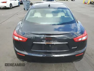 2015 Maserati Ghibli z VIN ZAM57XSA5F1129866, wystawiony jako Copart lot #51738015 z przebiegiem Nie podano mil oraz Szkoda całkowita • Salvage title. Historia ofert i sprzedaży dostępna na DreamBid. Obrazek 6.