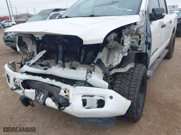 2019 Nissan Titan SV with VIN 1N6AA1E59KN530160, listed as a IAAI auction lot 41557126 with 128,594 mi miles. Bid and sale history available at carsss.com. Image 6.
