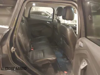 2013 Ford Escape SEL with VIN 1FMCU9H96DUC64584, listed as a IAAI auction lot 41357053 with 139,422 mi miles. Bid and sale history available at carsss.com. Image 8.