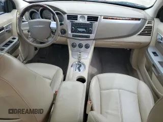 2009 Chrysler Sebring Touring z VIN 1C3LC56B29N560827, wystawiony jako Copart lot #58845265 z przebiegiem 102 081 mil mil oraz Szkoda całkowita • Salvage title. Historia ofert i sprzedaży dostępna na DreamBid. Obrazek 8.