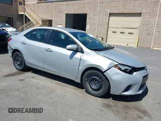 2015 Toyota Corolla L z VIN 2T1BURHE6FC311500, wystawiony jako IAAI lot #42273101 z przebiegiem 148 620 mil mil oraz . Historia ofert i sprzedaży dostępna na DreamBid. Obrazek 1.