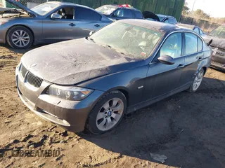 2006 BMW 3 Series 330xi with VIN WBAVD33586KV60409, listed as a IAAI auction lot 41436848 with 999,999 mi miles. Bid and sale history available at carsss.com. Image 2.