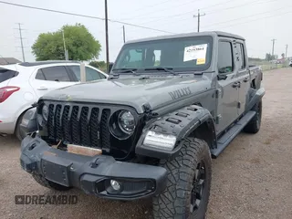 2022 Jeep Gladiator Texas Trail z VIN 1C6HJTAG2NL176011, wystawiony jako IAAI lot #42193864 z przebiegiem 27 219 mil mil oraz . Historia ofert i sprzedaży dostępna na DreamBid. Obrazek 22.