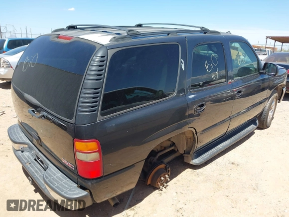 2003 GMC Yukon SLT with VIN 1GKEC13T43R179964, listed as a IAAI auction lot 42027658 with 1 mi miles. Bid and sale history available at carsss.com. Image 4.