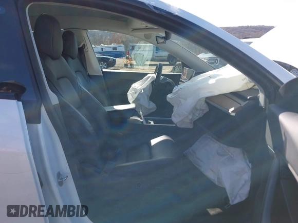 2021 Tesla Model Y Long Range with VIN 5YJYGDEE9MF239726, listed as a IAAI auction lot 41952158 with 37,088 mi miles and . Bid and sale history available at DreamBid. Image 5.