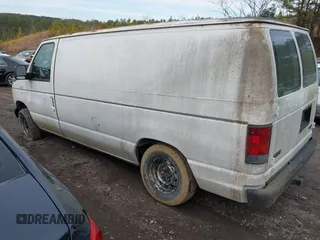 2003 Ford Econoline Cargo with VIN 1FTRE14203HB80127, listed as a IAAI auction lot 41462657 with 111,758 mi miles and . Bid and sale history available at DreamBid. Image 3.