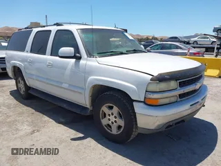 2002 Chevrolet Suburban LT z VIN 3GNFK16T82G356407, wystawiony jako IAAI lot #42818297 z przebiegiem 422 552 mil mil oraz . Historia ofert i sprzedaży dostępna na DreamBid. Obrazek 1.