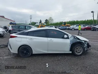 2020 Toyota Prius LE with VIN JTDKARFP2L3146028, listed as a IAAI auction lot 42192696 with 86,201 mi miles and . Bid and sale history available at DreamBid. Image 14.