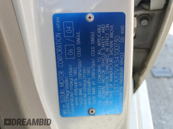 2005 Suzuki XL7 LX z VIN JS3TX92VX54100730, wystawiony jako Copart lot #74913534 z przebiegiem 91 838 mil mil oraz Szkoda całkowita • Salvage title. Historia ofert i sprzedaży dostępna na DreamBid. Obrazek 13.